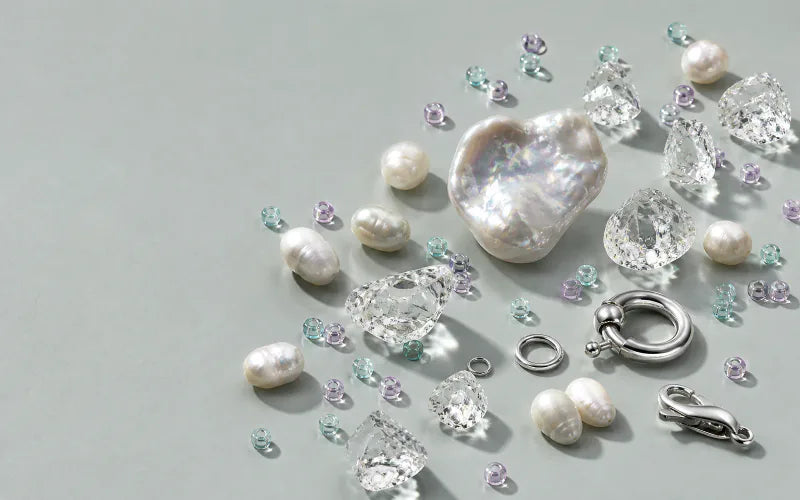 A close look at irregular pearls, clear crystal, glass beads and metal spacers